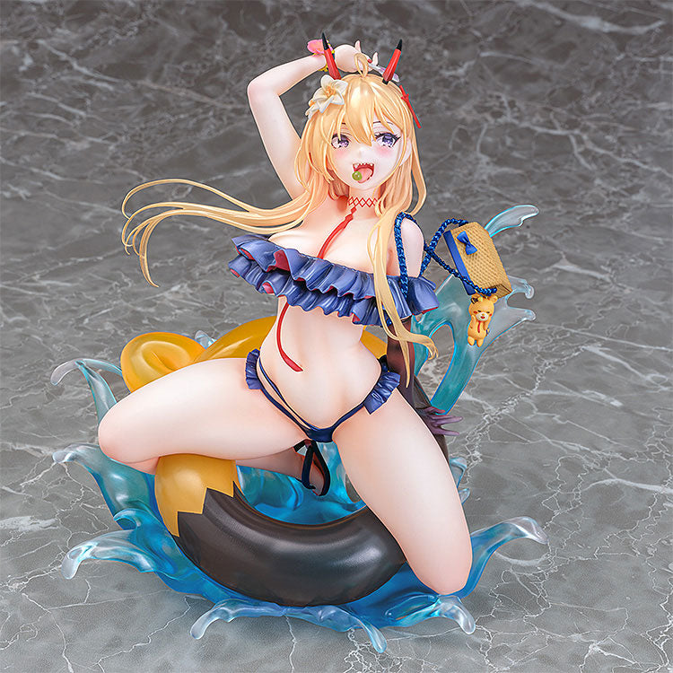 The Azur Lane Kumano Fancy Waves figure shows a blonde girl in a blue bikini with red horns, a flower, and candy in her mouth, sitting on an inflatable ring with water effects