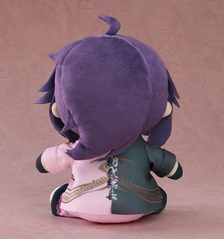 Rear view of Kson plushie displaying flowing hair and embroidered costume details