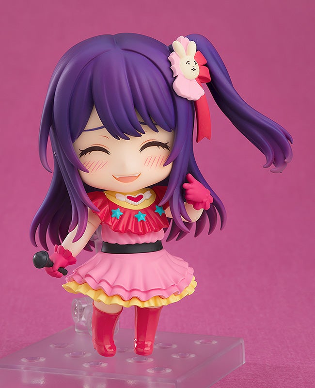 Nendoroid Ai sitting with crossed legs and happy expression, showing versatility of pose