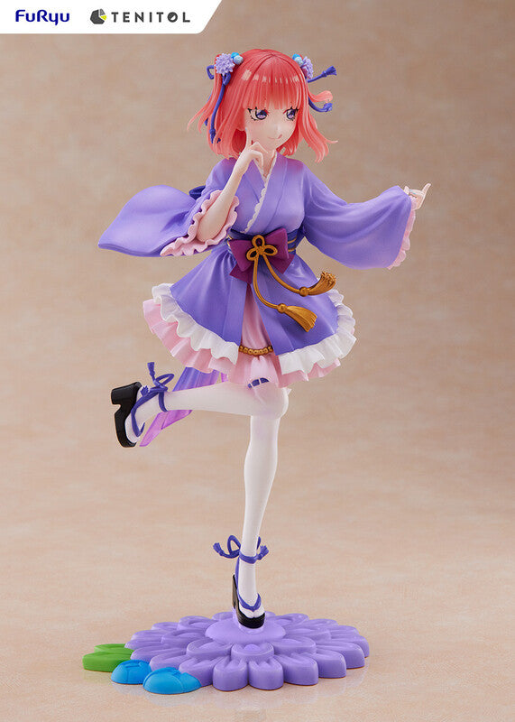 Rear view of Tenitol Nino figure highlighting dynamic hair sculpt and base