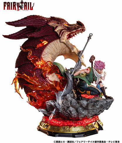 Fairy Tail statue: Natsu battles a large red dragon amidst flames on a detailed rocky base