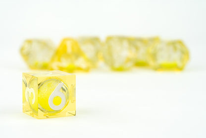 Single dice image of Shadow Light UV Reactive Elixir Liquid Core RPG Dice