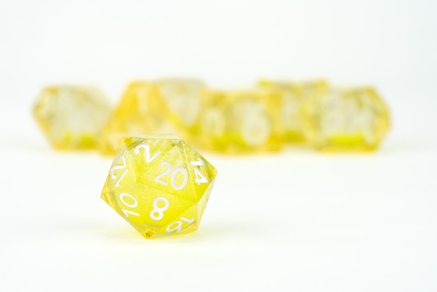 Single dice image of Shadow Light UV Reactive Elixir Liquid Core RPG Dice