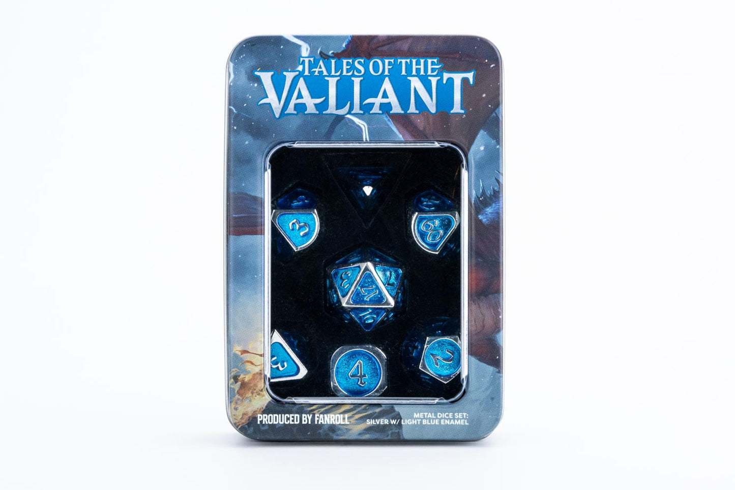 FanRoll Tales of the Valiant metal dice set displayed in a decorative arrangement