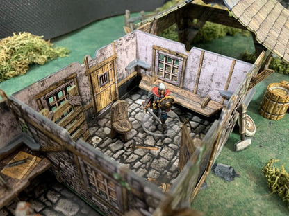Tabletop RPG scene: Armored knight miniature stands in a medieval room with stone floor, wooden walls, bench, and chair.