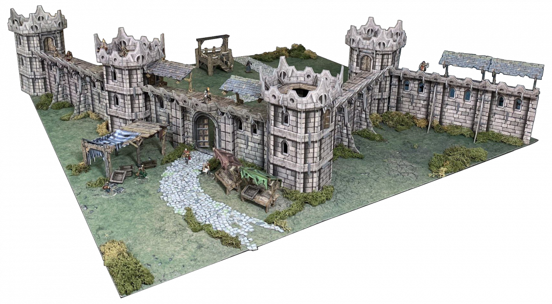 A detailed miniature model of a fortified stone castle wall with towers, a main gate, market stalls, and small figures on grass.