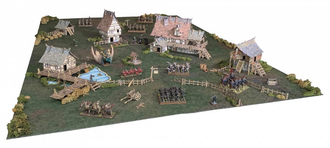 A detailed miniature wargame battlefield featuring fantasy armies, medieval buildings, a pond, and a large dragon.