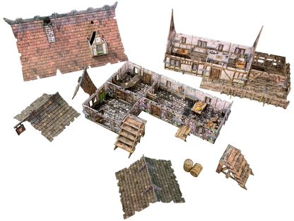 Disassembled modular fantasy inn model showing roofs, timber-framed walls, and detailed interiors with furniture, stairs, and a bar.