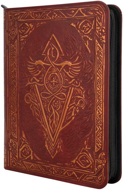 Dark red zippered binder with an intricate gold embossed design of a winged emblem within a triangle