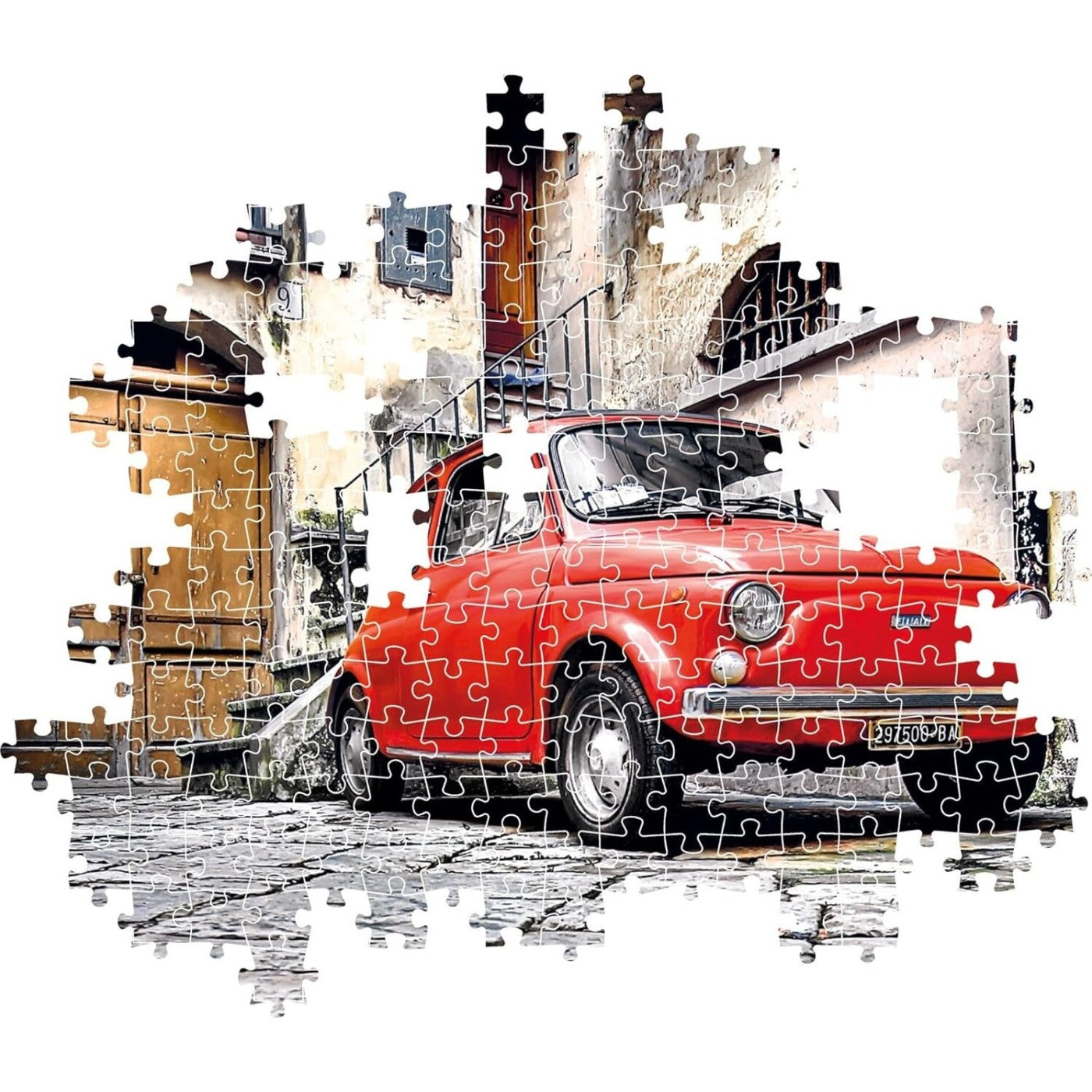 A jigsaw puzzle showing a red vintage car parked on a cobbled street against old buildings.
