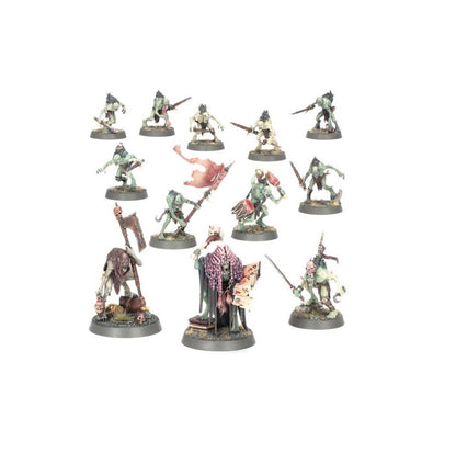 A collection of twelve painted fantasy wargaming miniatures featuring ghouls and a grotesque leader
