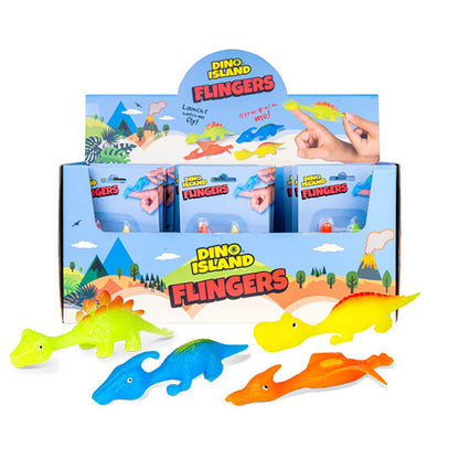Display box of Dino Island Flingers, brightly colored stretchable dinosaur toys. Several green, blue, yellow, and orange dinos lie on white