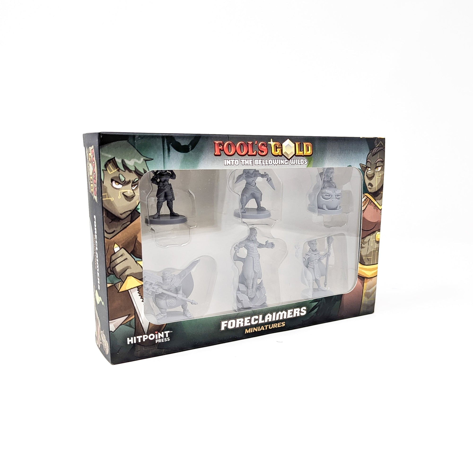 Box of Fool's Gold: Foreclaimers Miniatures, showing six unpainted grey fantasy figures through a clear window