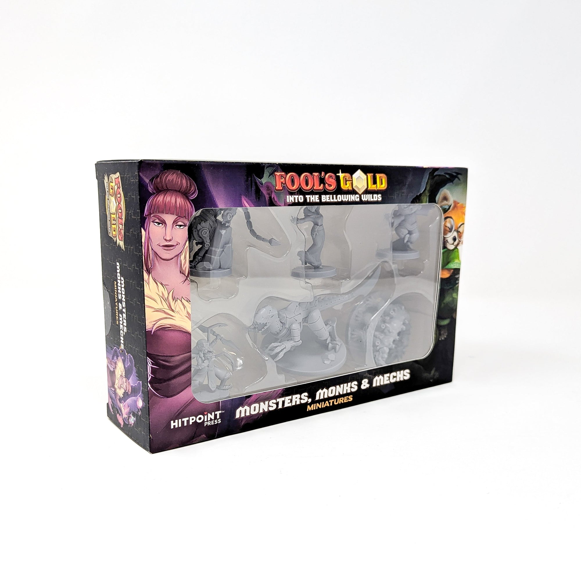 A box of "Fool's Gold: Monsters, Monks & Mechs" miniatures displaying unpainted grey fantasy figures