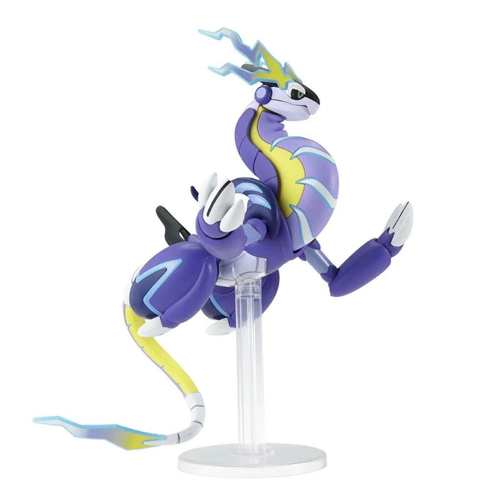 Miraidon Pokémon action figure (purple, yellow, and blue dragon) posed dynamically on a clear display stand