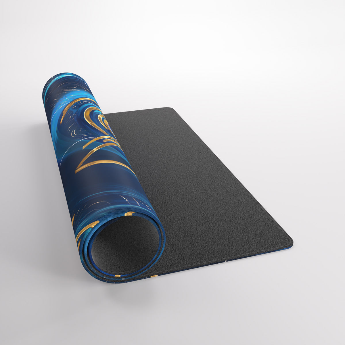 Partially unrolled playmat with a swirling blue and gold design, revealing its textured black underside