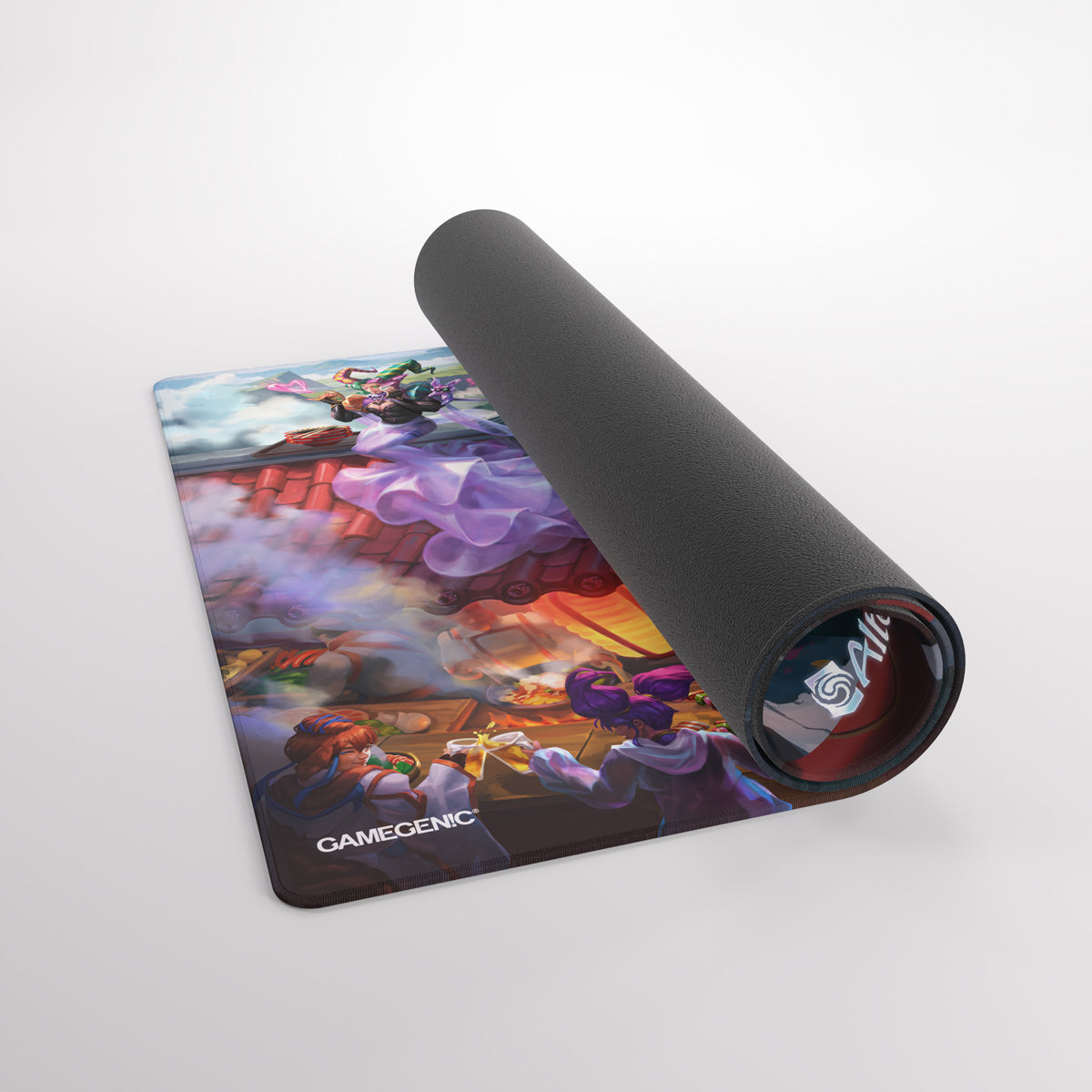 Partially unrolled Gamegenic playmat with vibrant fantasy art depicting characters toasting and a dragon over a rooftop