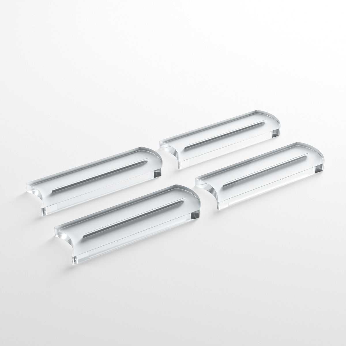 Set of four clear acrylic card stands arranged