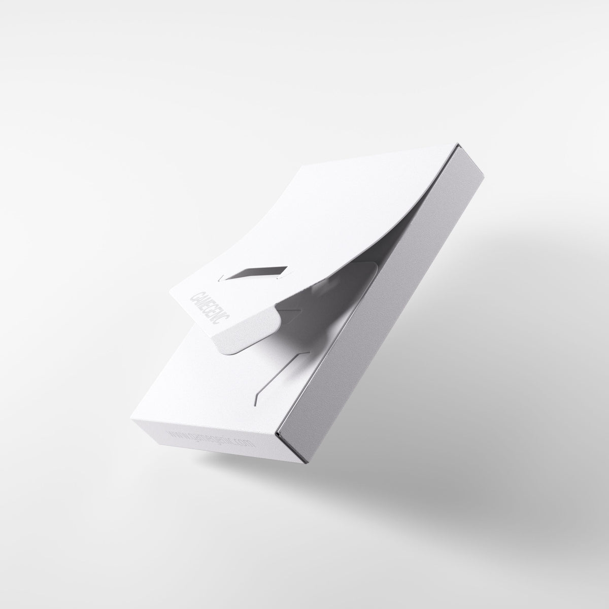 A white Gamegenic Cube Pocket 15 Card Holder is shown partially open, revealing an interior slot and texture, against a light gray background