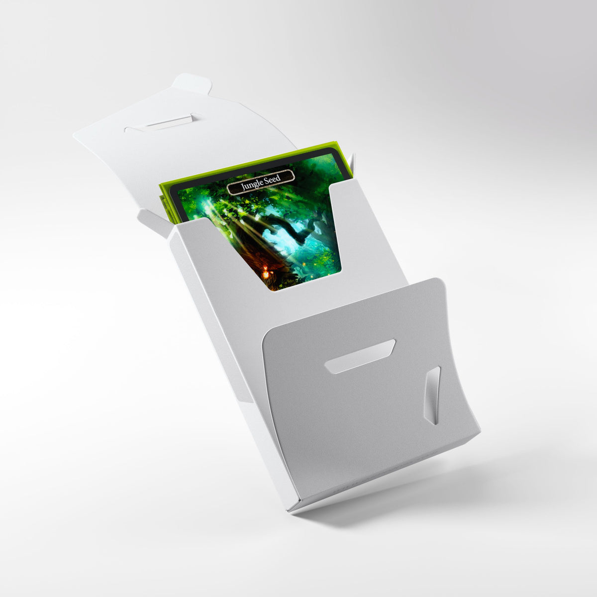 A white Gamegenic Cube Pocket 15 Card Holder open, revealing a stack of cards with a Jungle Seed card on top