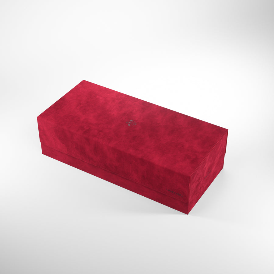 A red velvet rectangular box with a subtle logo on the lid, on a white background