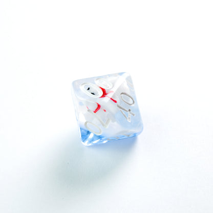 Translucent blue and white swirled polyhedral die featuring a white snowman-like figure with red details inside