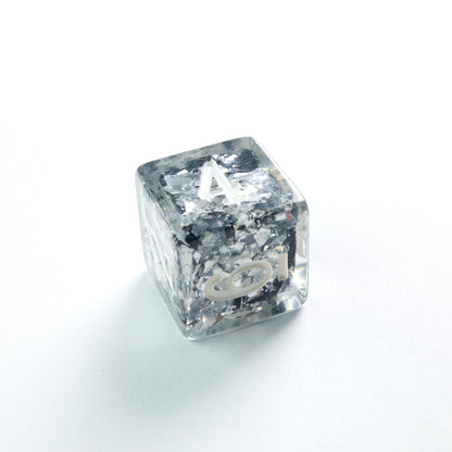 Silver glitter keycap with white letter 'A' on top and 6 on front, on a white background