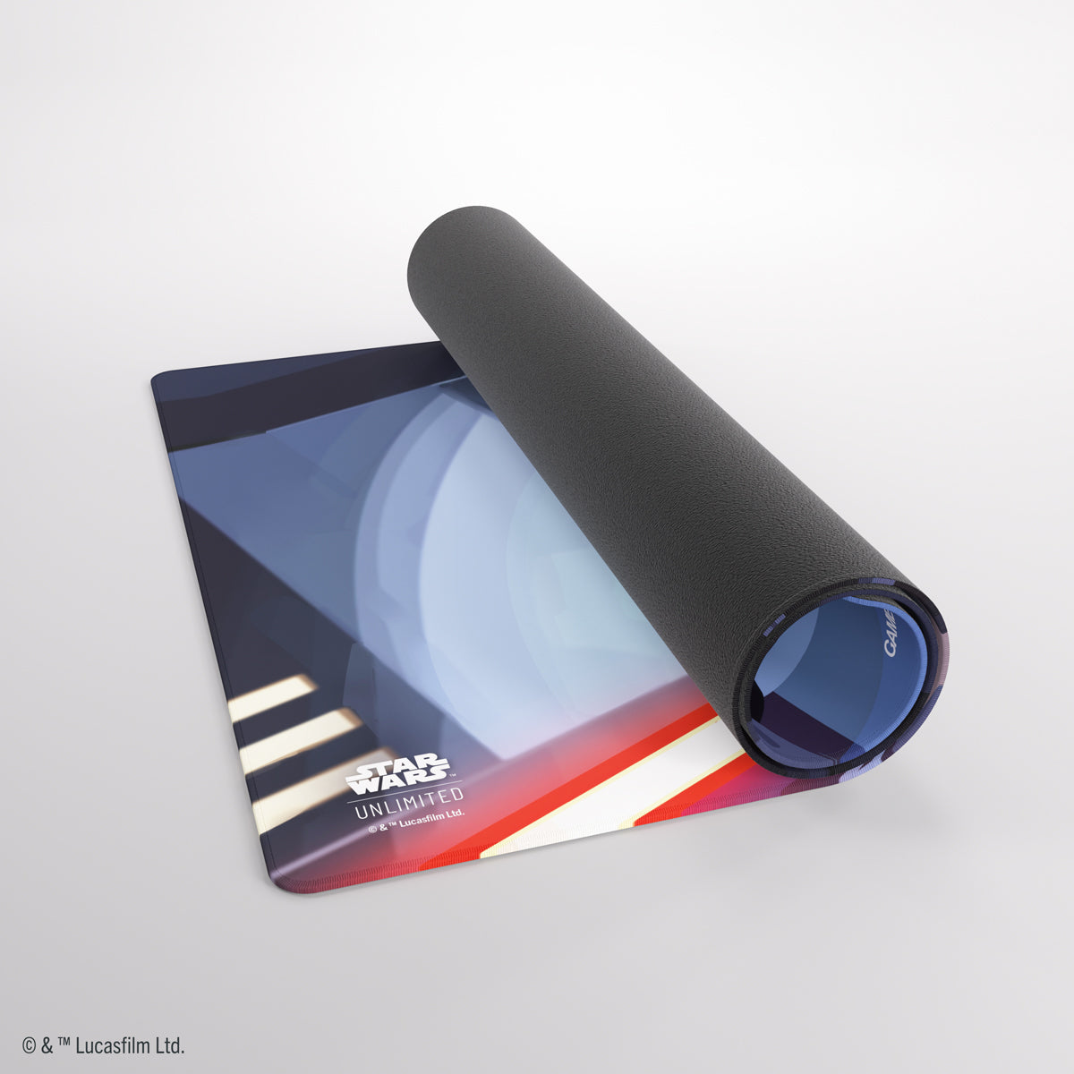 Partially rolled Star Wars Unlimited game mat displaying a blue, white, and red futuristic design