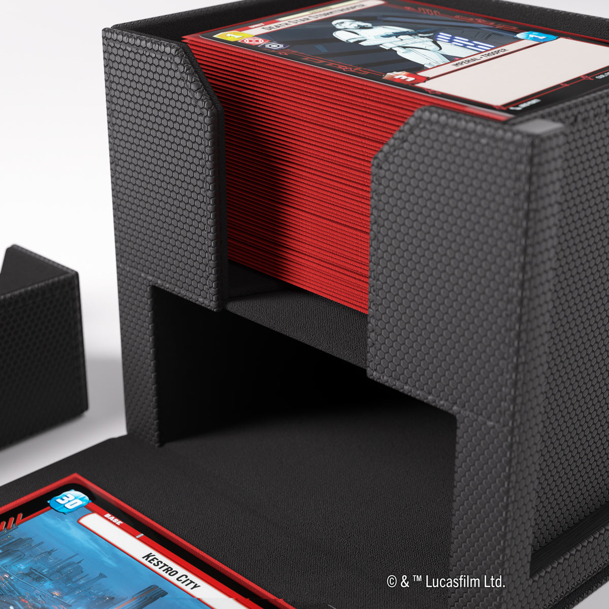 Black textured deck box holding red-backed Star Wars cards, with a &quot;Kestro City&quot; card visible