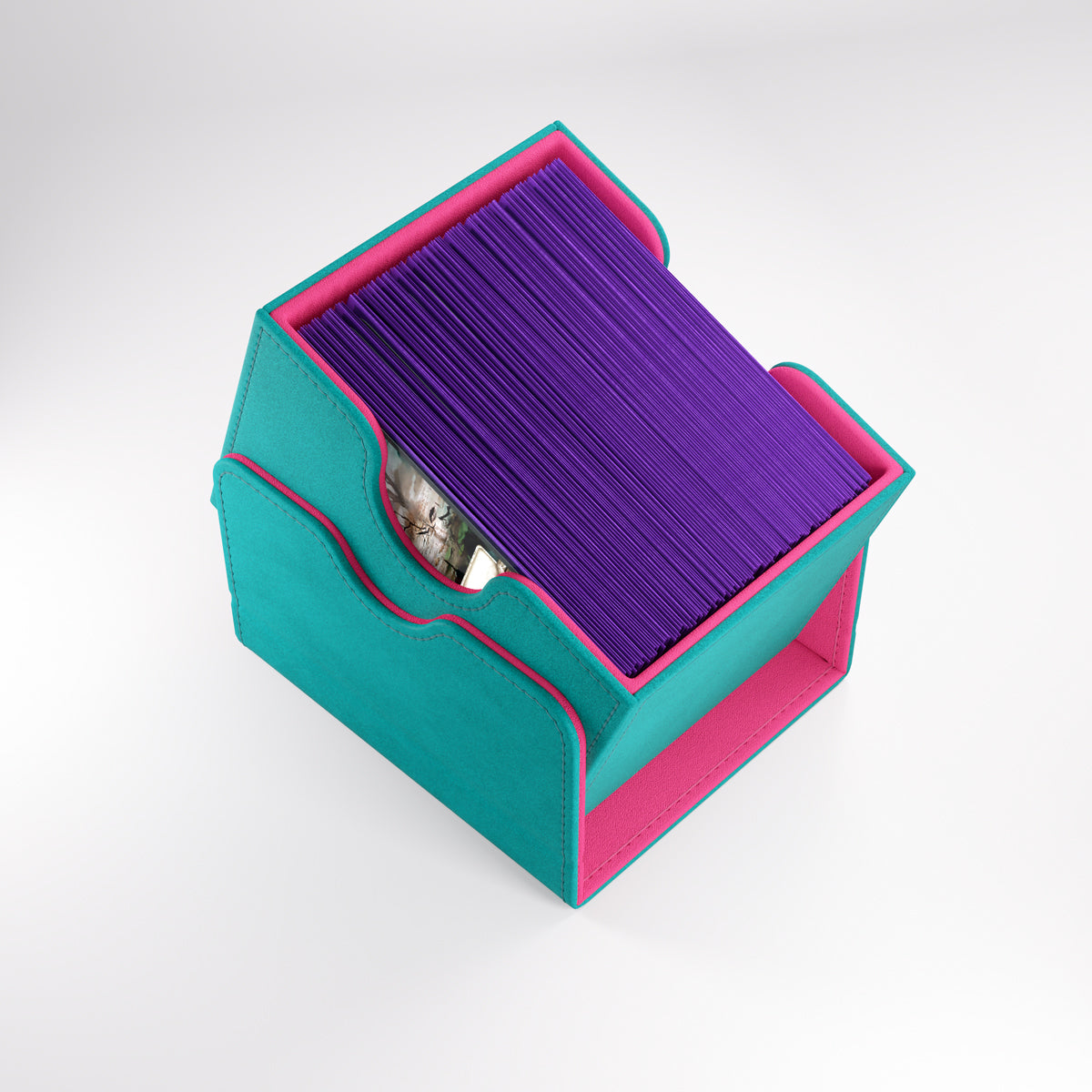 Teal/Pink gamegenic sidekick 100+ XL convertible deck box filled with sleeved trading cards sleeves
