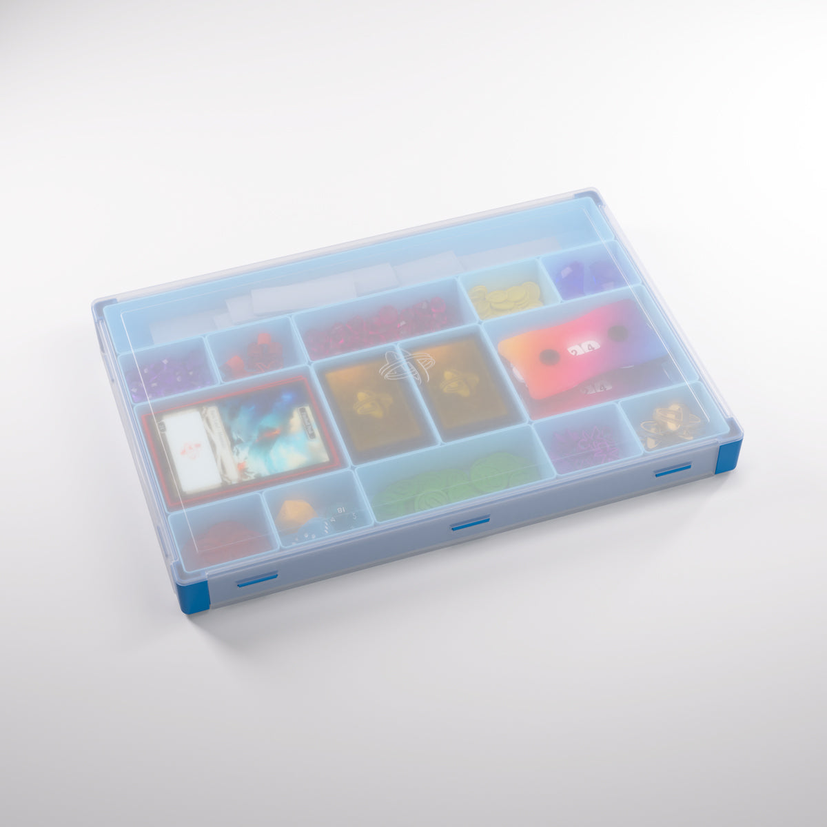 Interior compartments of blue Silo XL holding game tokens