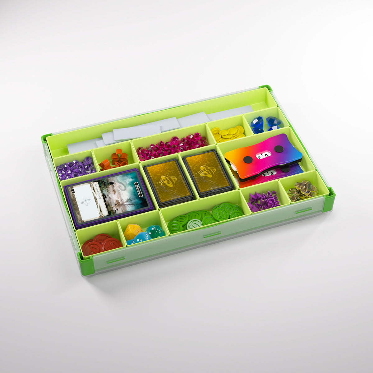 Detailed close-up of compartment layout inside the green token box
