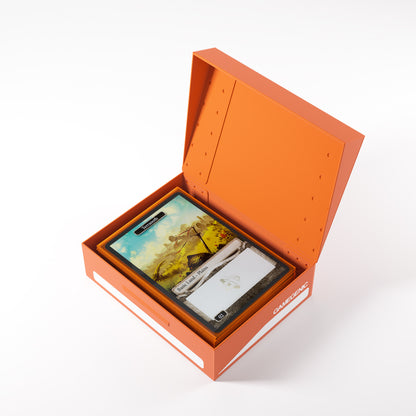 Open orange card storage box containing sleeved trading cards. Top card is a Basic Land - Plains
