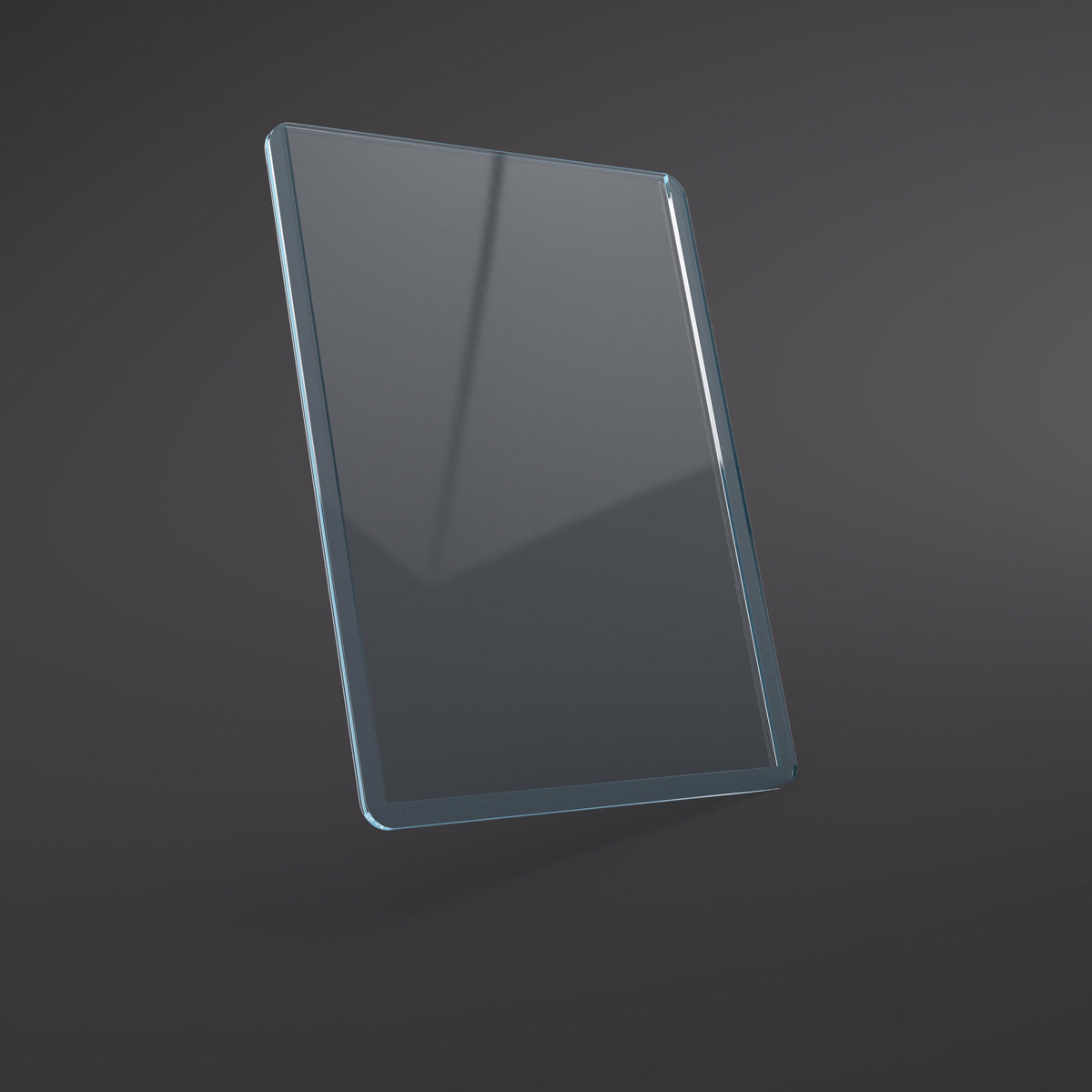 A clear rectangular Premium Toploading Exoshield stands angled against a dark grey background
