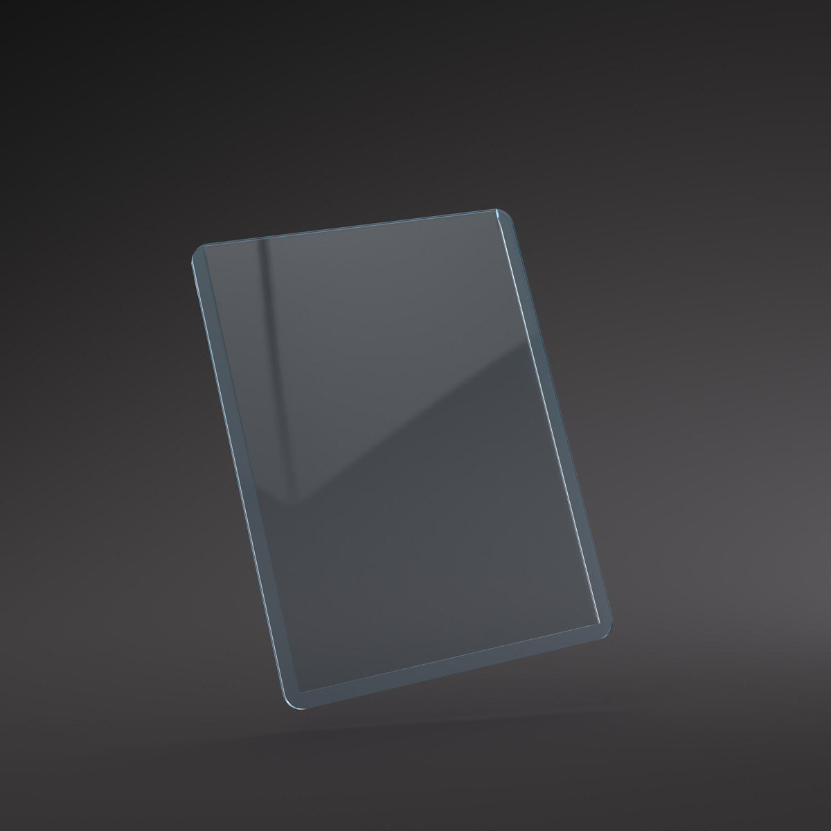 A single clear rectangular Gamegenic Premium Toploading Exoshield angled against a dark background