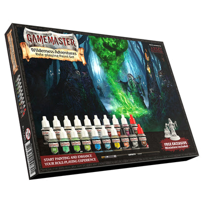 A Gamemaster Role-playing Paint Set box with fantasy art, paints, a brush and an unpainted miniature