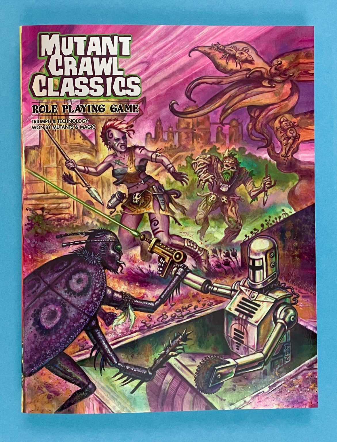 Cover for Mutant Crawl Classics RPG: A female mutant, robot, and insect creature clash amidst ruins under a pink sky