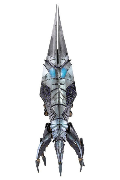 Pointed metallic sci-fi figure with glowing blue segments and sharp mechanical claws