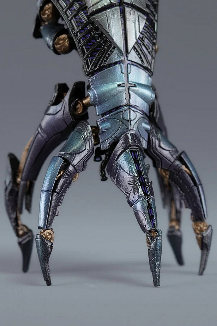 Detailed metallic sci-fi action figure with iridescent silver and blue articulated spider legs
