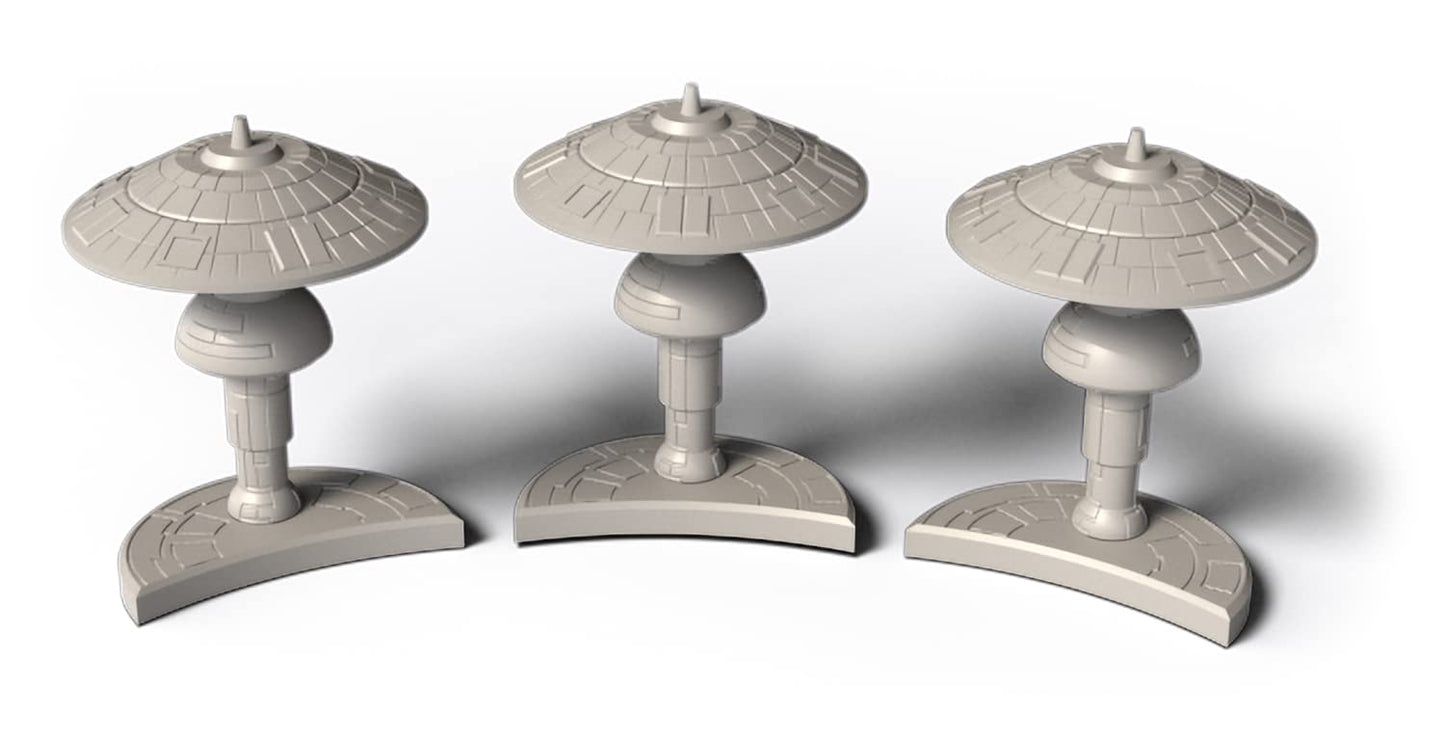 Three light grey sci-fi structures with disc-shaped tops, bulbous middles, and semi-circular bases.