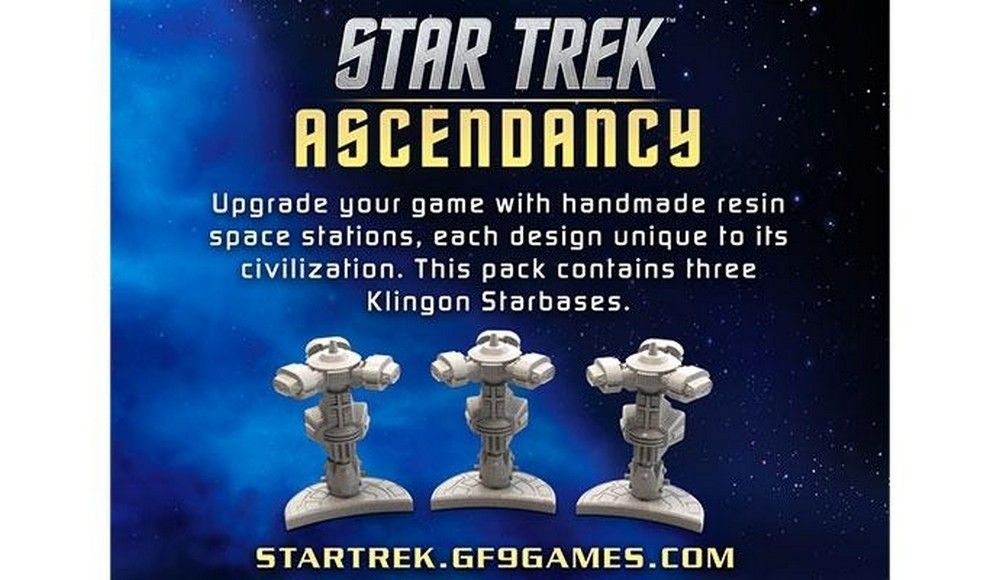 Three grey resin Klingon Starbase miniatures for the Star Trek Ascendancy game, against a starry blue background.
