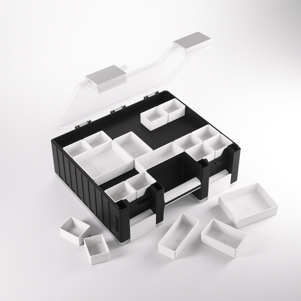 Open black and white organizer box with a clear lid and many removable white compartments, some outside