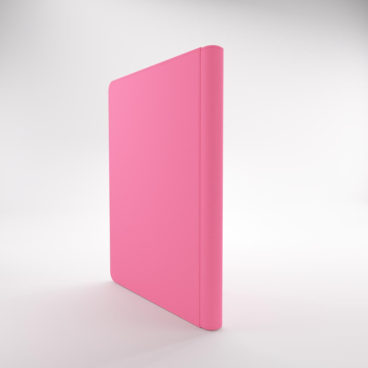Textured hot pink Gamegenic trading card Zip-Up Album standing upright on a white background