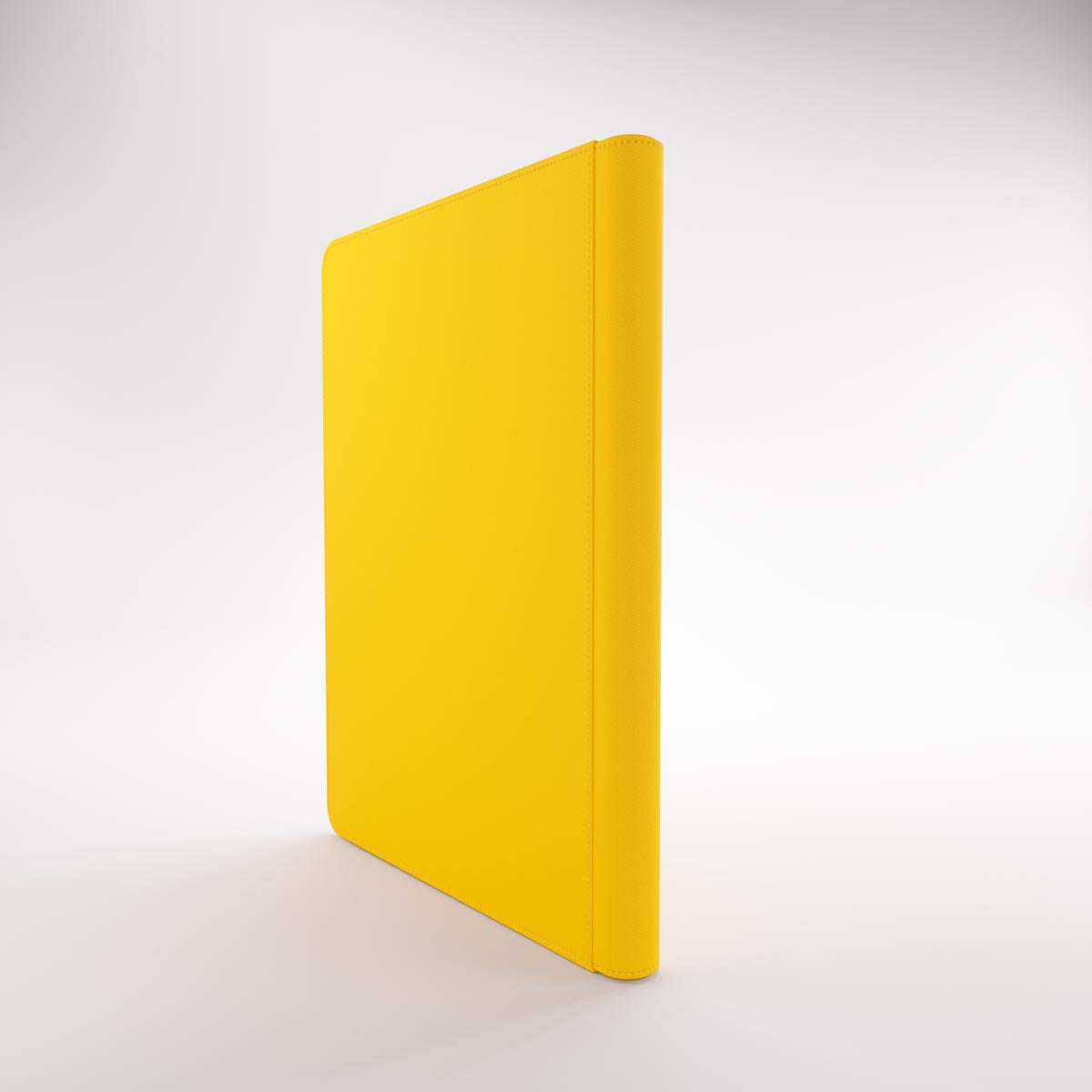 Yellow leather-texture Gamegenic trading card Zip-Up Album standing upright on a white background