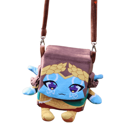 A blue, square plush Lathril ARTY Deck Box shaped like a character wearing a gold wreath, hanging from a brown strap