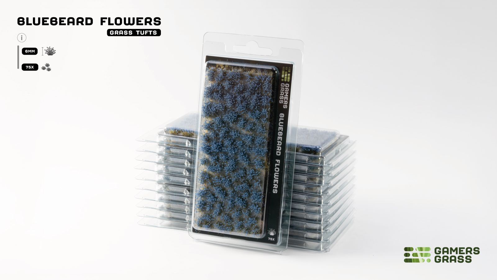 Clear package of Bluebeard Flowers grass tufts (6mm model scenery) with a stack of more packages behind it
