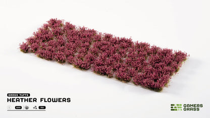 Miniature purple heather flower grass tufts on a sheet for model scenery