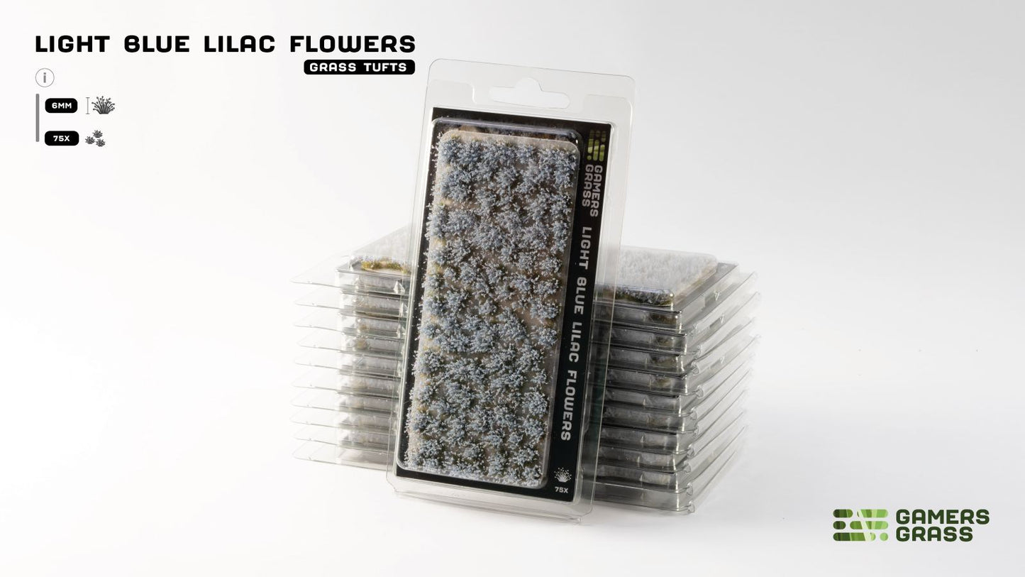 Stacked packages of Gamers Grass Light Blue Lilac Flowers Grass Tufts