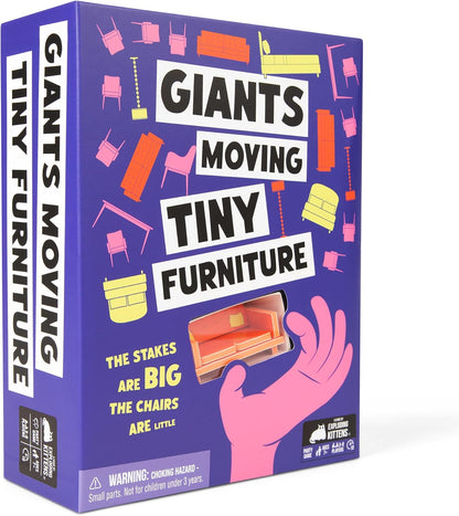 Giants Moving Tiny Furniture board game box. Purple, with colorful furniture surrounding a pink hand holding a tiny sofa