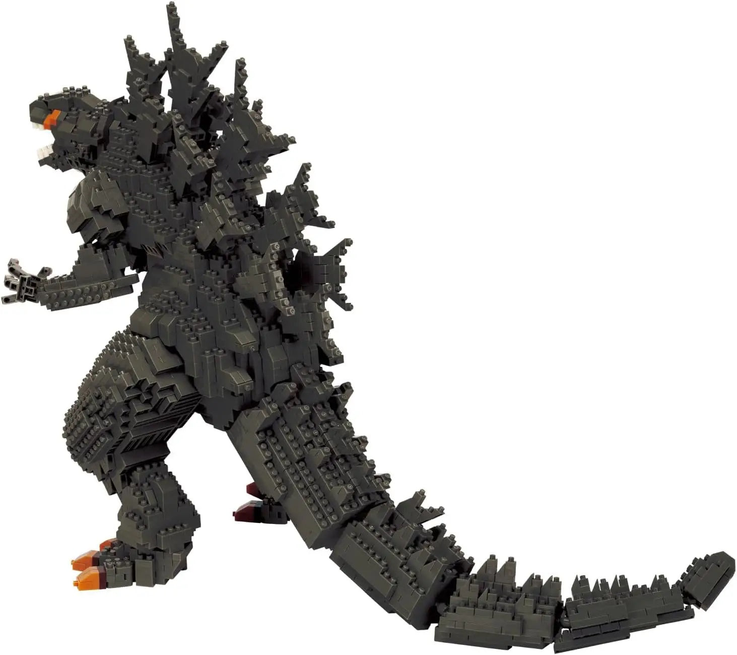 Dark grey Godzilla monster figure constructed entirely from interlocking toy bricks, posed aggressively on a white background